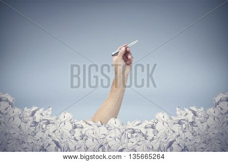 Hand wirting with pen against white background with vignette