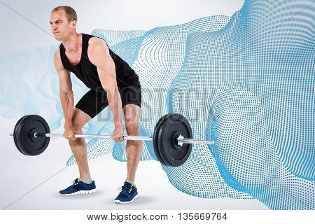 Bodybuilder lifting heavy barbell weights against grey background