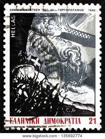 GREECE - CIRCA 1982: a stamp printed in the Greece shows Blowing Up a Bridge Painting by A. Tassos National Resistance Movement circa 1982