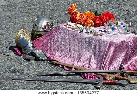detail of old knight's armor and sword