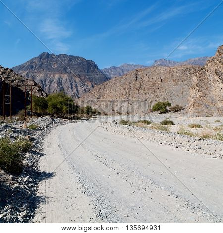 In Oman  The Old Mountain Gorge And Canyon The Deep Cloudy  Sky