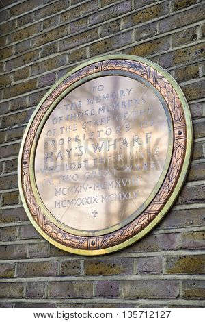 A golden memorial plaque dedicated to members of staff of the proprietors of Hays Wharf in London who lost thie lives during the two Great Wars.