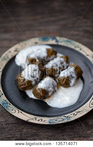 Romanian sarmale which are vine leaves stuffed with meat and rice