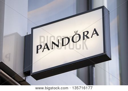 LONDON UK - APRIL 7TH 2016: The sign for a Pandora jewellery store on Oxford Street London on 7th April 2016.