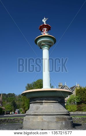 A view of a large Victorian era fountain in Bridge of Allan