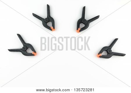 Over head shot group of plastic clamper isolated white background