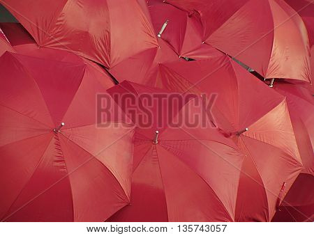 Open red umbrellas
