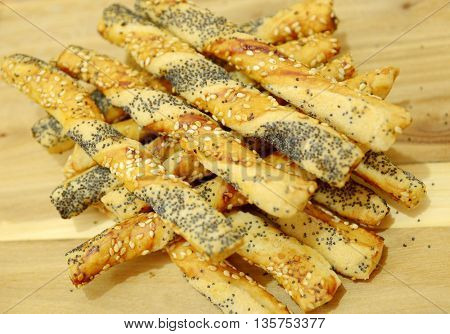 salty sticks with sesame and poppy seeds, Bread sticks or Pretzel sticks