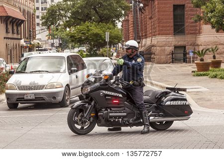 SAN ANTONIO TX USA - APR 11: Sheriff on Honda Goldwing motorcycle in the city of San Antonio. April 8 2016 in Dallas Texas United States