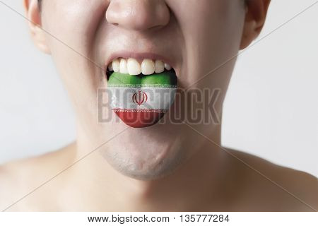 Iran Flag Painted In Tongue Of A Man - Indicating Persian And Farsi Language And Speaking