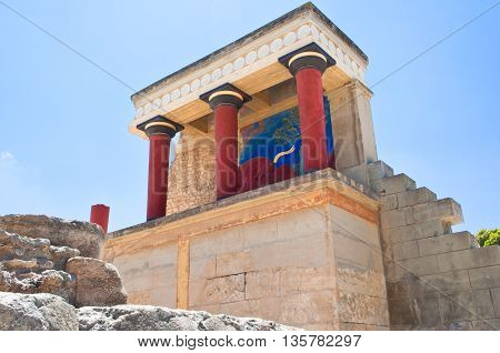 North Entrance with charging bull fresco at the background at the Knossos palace on the Crete island Greece.