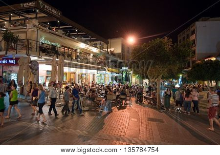 CRETEHERAKLION-JULY 24: Nightlife in Heraklion on the Lions Square on July 242014 on the Cete island Greece. Heraklion is the largest city and the capital of the island of Crete Greece.