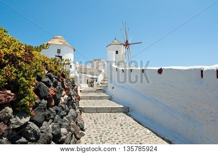 Walking path leading to the Oia windmill on the island of Santorini (Thera). Cyclades islandsGreece.