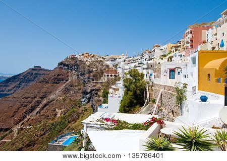 SANTORINIFIRA-JULY 28: Fira landscape on the edge of caldera on July 282014 in Fira town on Santorini Greece. Fira is the modern capital of the Greek Aegean island Santorini.