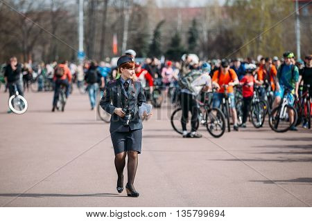 Gomel, Belarus - April 10, 2015: Young female police officer is on Lenin Square in Homel