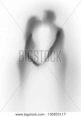 Slihouette of a lover couple, kiss and holding hands