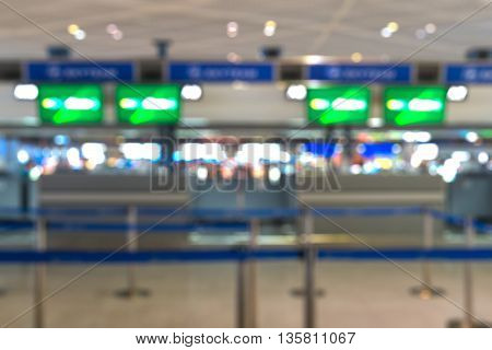 Check-in ticketing counter at international airport - blurred