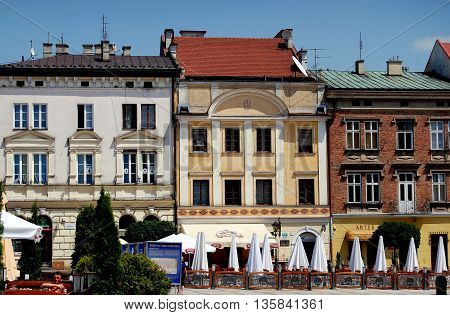 Tarnow Poland - June 12 2010: Baroque 18th century houses and outdoor cafés in the charming Rynek market square