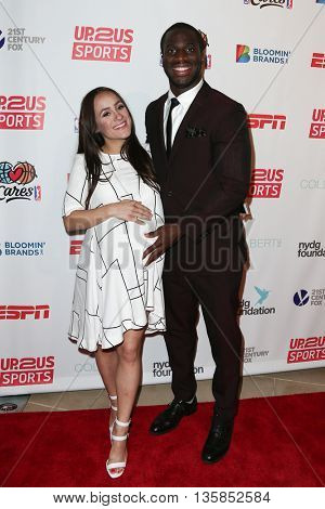 NEW YORK, NY-JUNE 3: New York Giants football player Prince Amukamara (R) and wife Pilar Davis attend the 2015 Up2Us Sports Gala at IAC Building on June 3, 2015 in New York City.