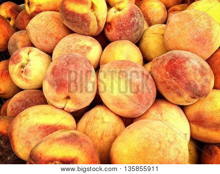 bunch of yellow peaches from the markers market