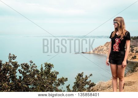 Girl And Oceanview From California Coast, United States