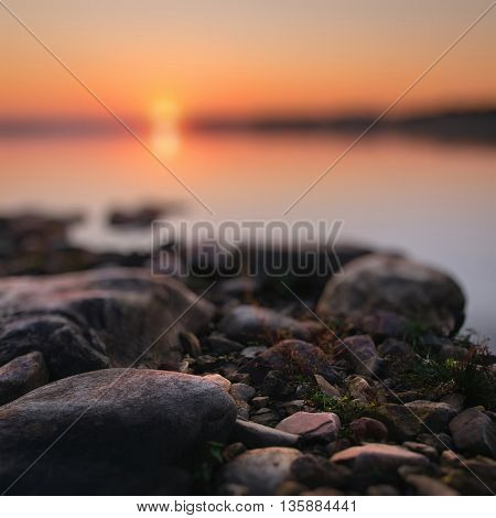 Sunset on the river with a rocky coast. Volga. Russia
