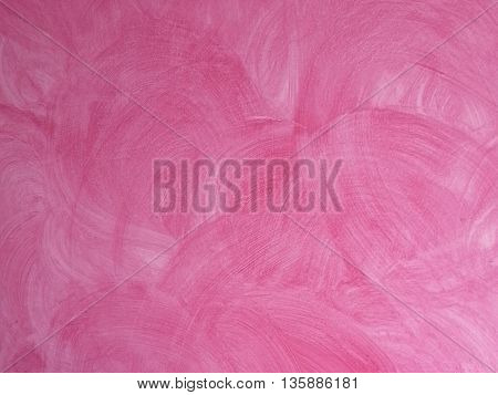 Stucco wall painted with a sweet pink colour