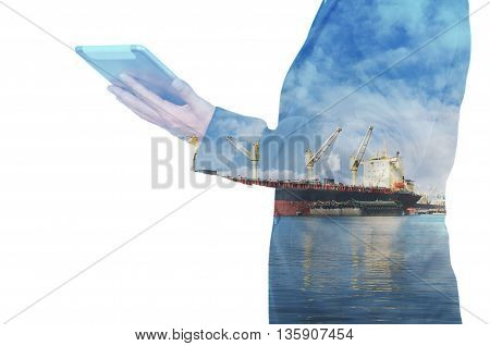 Double Exposure Of Businessman Hand Hold Tablet, Cargo Port Ship At Sea Port Concept