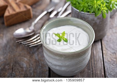 Horseradish and cream sauce in small cup