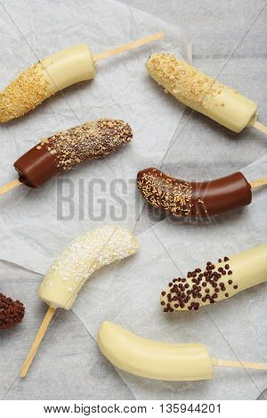Banana Covered In Chocolate On A Pergament
