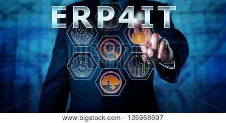 Male enterprise manager is pressing ERP4IT on a transparent virtual touch screen interface. Business management concept and IT terminology for Enterprise Resource Planning For Information Technology.
