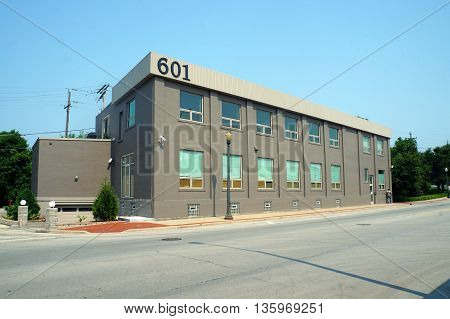 JOLIET, ILLINOIS / UNITED STATES - JUNE 30, 2015: A  vacant commercial building at 601 North Chicago Street in downtown Joliet.