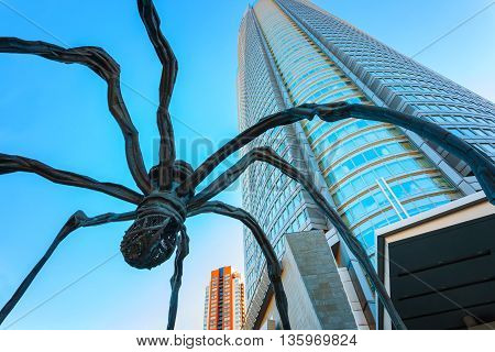 TOKYO JAPAN - NOVEMBER 28 2015: Maman - a spider sculpture by Louise Bourgeois situated at the base of Mori tower building in Roppongi Hills