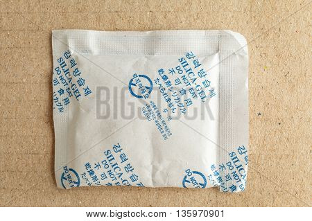 Close Up Silica Gel Or Desiccant, Non-english Text Translate To 
