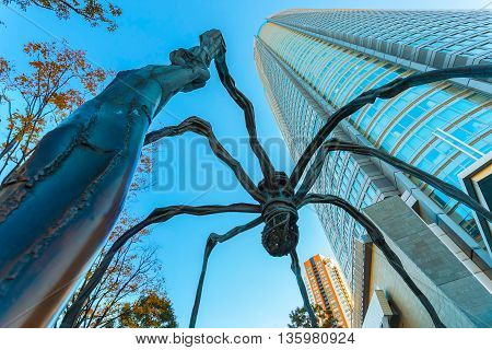 Tokyo, Japan - November 28 2015: Maman - A Spider Sculpture By Louise Bourgeois, Situated At The Bas