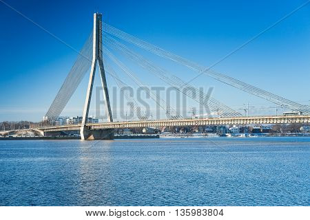 A view of the Vansu bridge over Daugava River in Riga, Latvia at winter