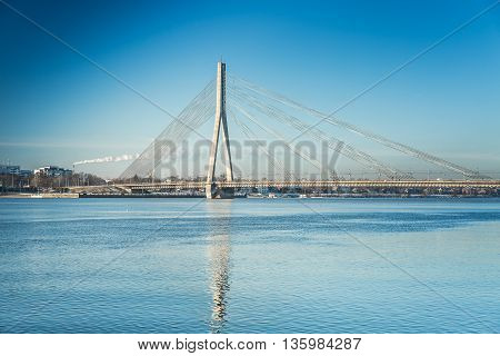 A view of the Vansu bridge over Daugava River in Riga, Latvia at winter