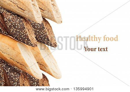 Cut baguette bread of different varieties on a white background. Rye wheat and whole grain bread. Isolated. Decorative frame of bread. Food background. Copy space.