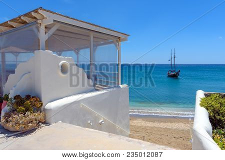 Tavern Terrace Overlooking The Aegean Sea, Paleochori Beach, Milos. Cyclades Island, Greece.