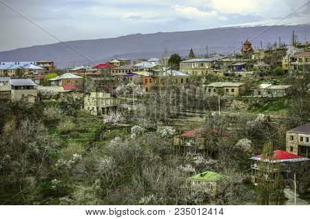 Ancient Town Of Ashtarak With Medieval Churches And Flowering Apricot Trees Against The Background O