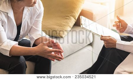 Doctor Or Psychiatrist Consulting And Diagnostic Examining Stressful Woman Patient On Obstetric - Gy