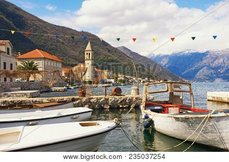 Mediterranean Landscape With Fishing Boats In A Small Harbor. Montenegro, View Of Bay Of Kotor And S