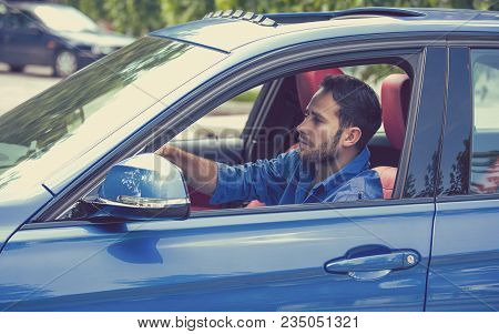 Happy Man With Hands On Wheel Driving New Car