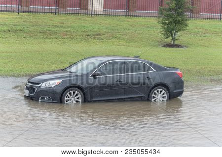 Car Swamped By Hurricane Flood Water In East Houston, Texas, Usa