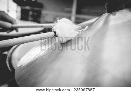 Musician Plays The Cymbals Of A Kettledrum With Drumstick