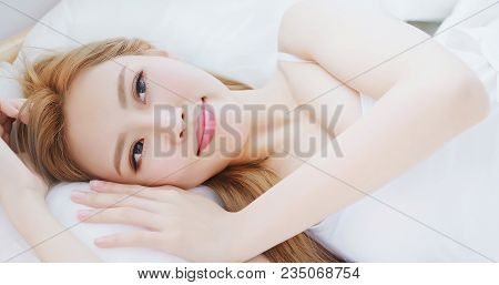 Woman Wake Up On Bed In The Morning
