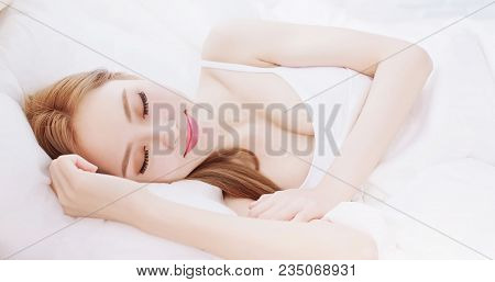Woman Sleep On The Bed At Home In Morning