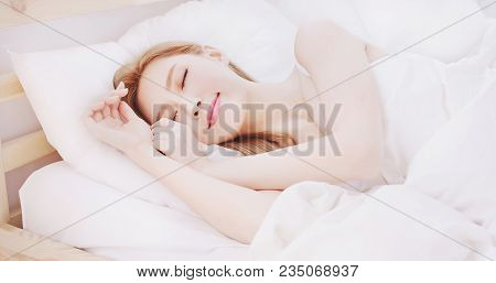 Woman Sleep On The Bed At Home In Morning