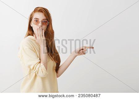 Woman Is Speechless After Witnessing Something Shocking. Beautiful Young European Redhead Standing H