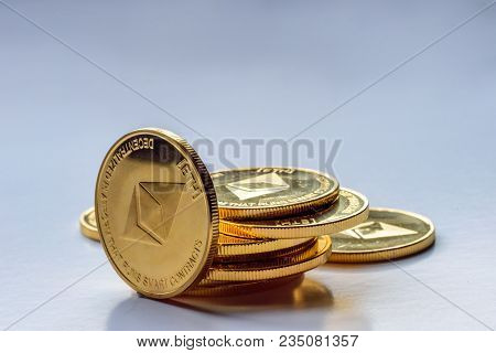 Golden Bitcoin Coins On A Dark Background With Euro Coins. Virtual Currency. Crypto Currency. New Vi